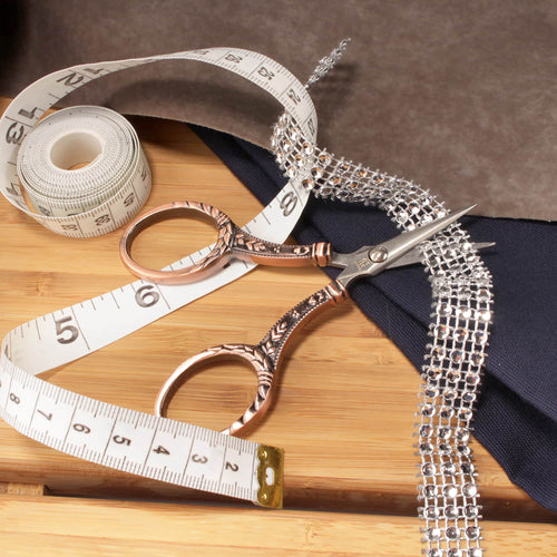 Embroidery Scissors with Decorative Cast Floral Handles by ribbon