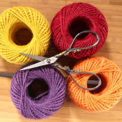 Embroidery Scissors with Decorative Srollwork Motif Handles Spool of Twine